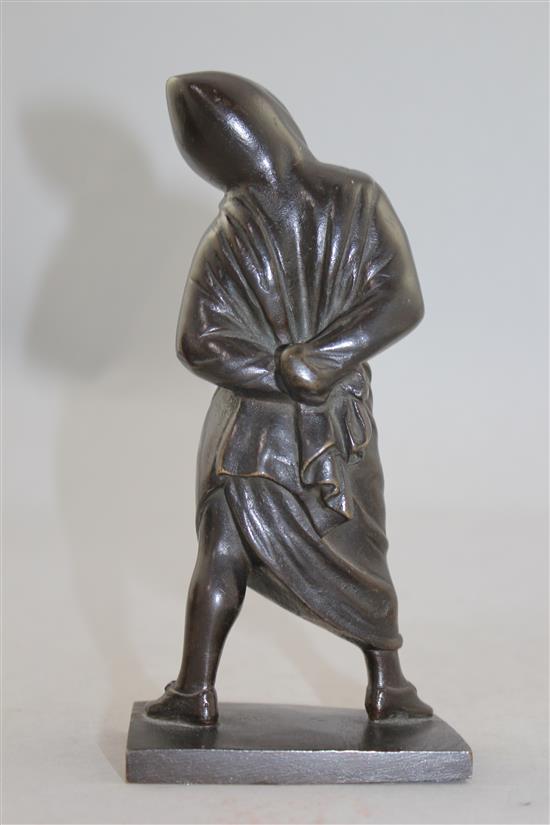 A small Italian patinated bronze of a figure standing in a hooded cloak, 6.75in.